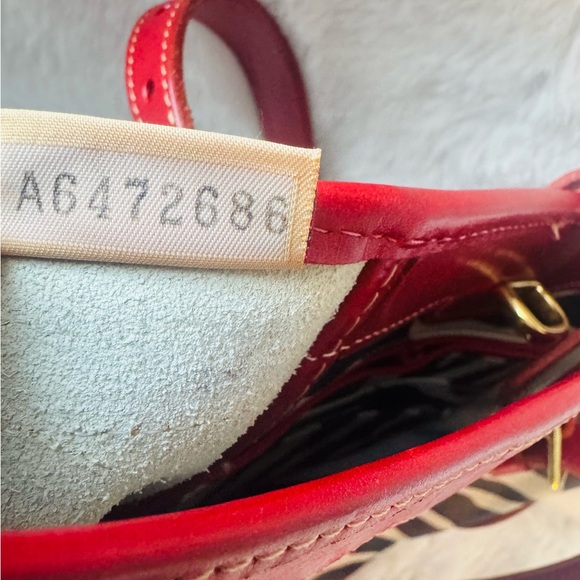 Dooney & Bourke Zebra Print Tote with Red Accents - Picture 10 of 11